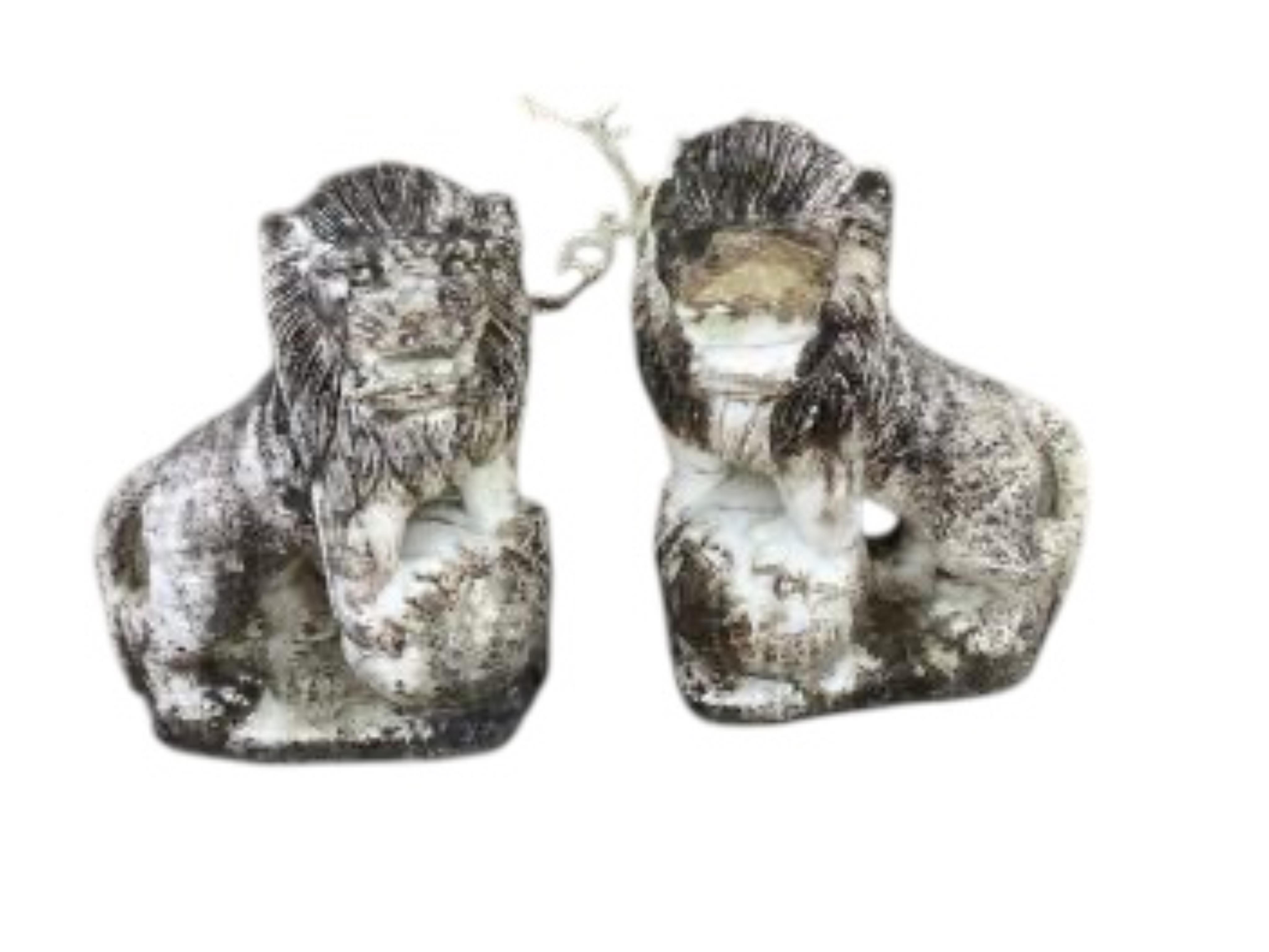 A pair of Chinese style reconstituted white marble models of kylin, (one in need of repair), height 71cm